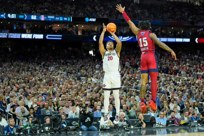 San Diego State Aztecs guard Matt Bradley shoots a jump shot with a FAU defender reaching up to try and guard it